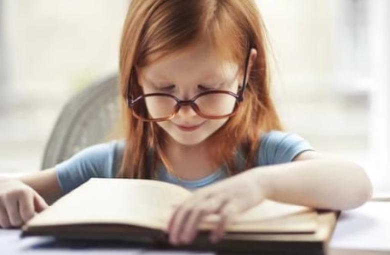 young girl with book